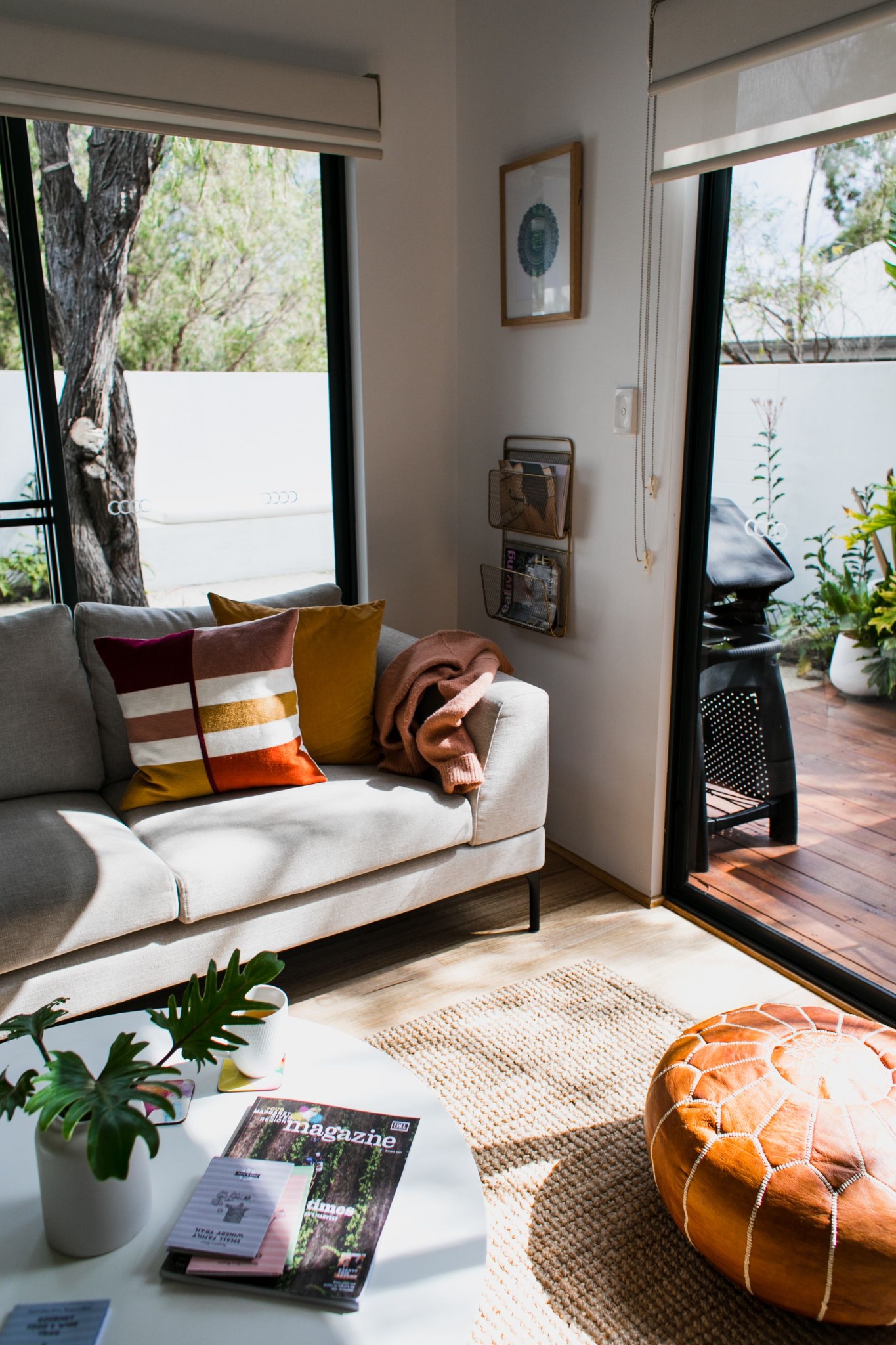 A warm, sunlit living room prepared for a relaxed stay